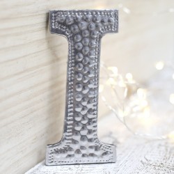4 letras plateadas I