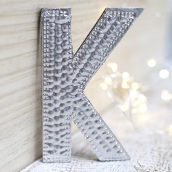 4 letras plateadas K