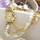Reloj brazalete - perlas y cristal lila